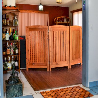 Privacy Screen (Options: 3-Panel, 4' H, Mature Redwood, No View Window Opening, 3/8" Openings, No Boots, Transparent Premium Sealant). Photo also shows a Flexible Wood Floor Mat and a Wine Rack. 