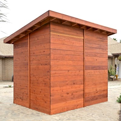 Raul’s Rad Redwood Sauna (Options: 11' W, 8' D, 11' H, California Redwood (for Interiors) & Mature Redwood (for Exteriors), Pitch Roof for Exterior Areas, "L" Shape Bench (2 levels), Transparent Premium Sealant).