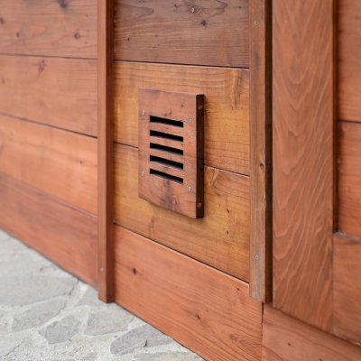 Raul’s Rad Redwood Sauna (Options: 11' W, 8' D, 11' H, California Redwood (for Interiors) & Mature Redwood (for Exteriors), Pitch Roof for Exterior Areas, "L" Shape Bench (2 levels), Transparent Premium Sealant).
