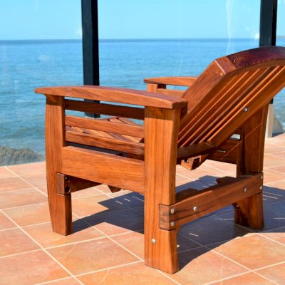 Reclining Redwood Easy Chair (Options: Mature Redwood, No Cushion, Transparent Premium Sealant). Photo shows fully reclined position.