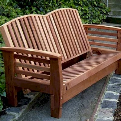 Reclining Redwood Loveseat (Options: Redwood, No Cushion, Transparent Premium Sealant). Upright Position. 