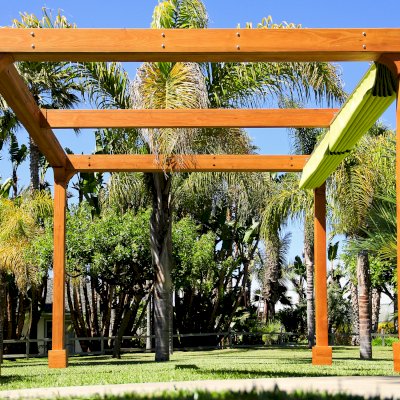 Retractable Canopy Pergola (Options: 12' L x 12' W, No Privacy Panel, Douglas-Fir, 9ft Post Height, No Electrical Wiring Trim, 4-Post Anchor Kit for High-Wind, No Post Decorative Trim, No Ceiling Fan Base, No Curtain Rods Transparent Premium Sealant).