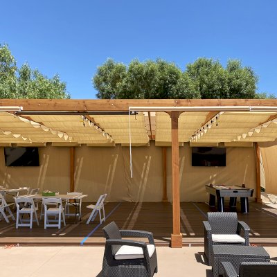 Retractable Canopy Pergola (Options: 24' W x 40' L, Douglas-fir, 8-Post Anchor Kit for Concrete, Transparent Premium Sealant). Photo Courtesy of El Paseo Tennis Club of Valencia, CA.