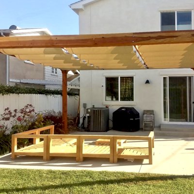 Retractable Canopy Pergola (Options: 18' L x 14' W, No Privacy Panel, California Redwood, 10' Post Height, 1 Electrical Wiring Trim, 4-Post Anchor Kit for Concrete, No Post Decorative Trim, No Ceiling Fan Base, No Curtain Rods Transparent Premium Sealant). Photo Courtesy of D. Evans of Los Angeles, California.