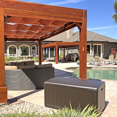 Custom Retractable Canopy Pergola (Options: 20' x 12', Mature Redwood, Posts Anchor Kit for High-Wind, Extra Thick Lumber by Custom Request, Transparent Premium Sealant). Retractable Shade Canopies Added by the Customer. Photo Courtesy of D. Ruprecht of Hollister, CA.