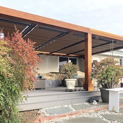 Retractable Canopy Pergola (Options: 25' L x 16' W, Attached to House by Custom Request, No Privacy Panel, California Redwood, 8" x 8" Posts by Custom Request, 8.5 ft Post Height, No Electrical Wiring Trim, No Ceiling Fan Base, No Curtain Rods, Transparent Premium Sealant). Photo Courtesy of J. Kennedy of San Jose, California.
