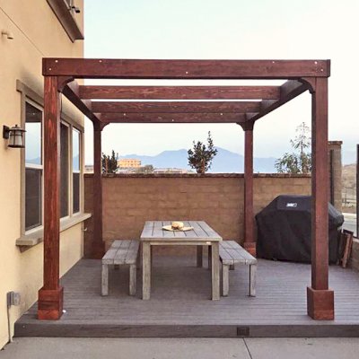 Retractable Canopy Pergola (Options: 14' L x 10' W, No Privacy Panel, California Redwood, 9ft Post Height, No Electrical Wiring Trim, 4-Post Anchor Kit for Concrete, No Post Decorative Trim, No Ceiling Fan Base, No Curtain Rods, Coffee-Stain Premium Sealant). Photo Courtesy of D. Kim of Rancho Mission Vieja, CA.