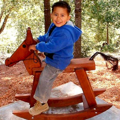 Rocking Horses - Note: Original smaller rocking horse design - classic photo from 2003 - we are sentimental and couldn't remove the photo...