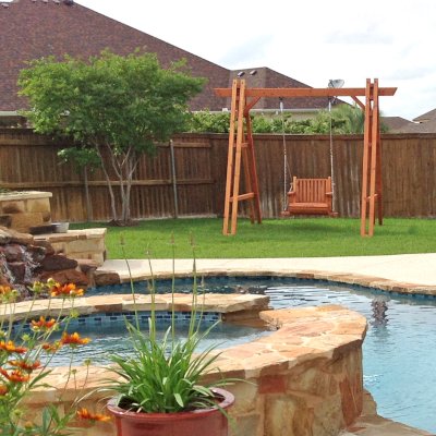 Rory's Armchair Swing Set (Options: Douglas-fir, Classic Design Seat, No Engraving, Transparent Premium Sealant). Photo Courtesy of M. Romero of Nolanville, Texas. 