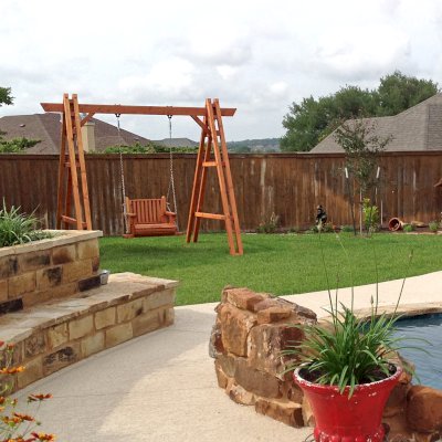 Rory's Armchair Swing Set (Options: Douglas-fir, Classic Design Seat, No Engraving, Transparent Premium Sealant). Photo Courtesy of M. Romero of Nolanville, Texas. 