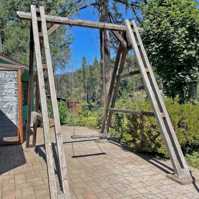 Custom Rory's Swing Set (Options: California Redwood, with Rory's Seat by Custom Request, No Engraving, Transparent Premium Sealant). Photo Taken 8 Years After Installation. Photo Courtesy of J. Farkas of of Vida, Oregon.