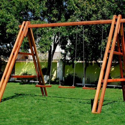 Rory's Giant Playground Swing Sets (Options: Mature Redwood, Standard Swing Seats, Transparent Premium Sealant). Photo shows swing before diagonal braces installation.