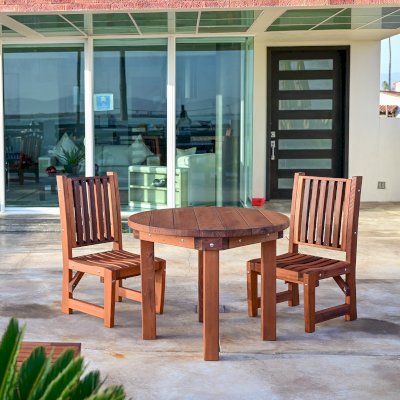 Round Outdoor Patio Table (Options: 3 1/2', 2 Chairs, Mature Redwood, Ruth Chairs, No Cushions, Side Chairs only (no arms), Standard Tabletop, No Lazy Susan, No Umbrella Hole, Transparent Premium Sealant).  Photo Courtesy of The Estero Beach Resort of Ensenada, Mexico. 