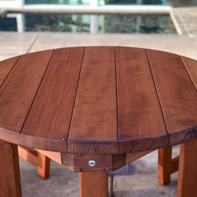 Round Outdoor Patio Table (Options: 3 1/2', 2 Chairs, Mature Redwood, Luna Chairs, No Cushions, Side Chairs only (no arms), Standard Tabletop, No Lazy Susan, No Umbrella Hole, Transparent Premium Sealant).  Photo Courtesy of The Estero Beach Resort of Ensenada, Mexico. 