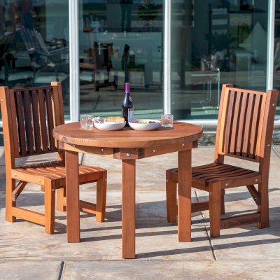 Round Outdoor Patio Table (Options: 3 1/2', 2 Chairs, Mature Redwood, Ruth Chairs, No Cushions, Side Chairs only (no arms), Standard Tabletop, No Lazy Susan, No Umbrella Hole, Transparent Premium Sealant).  Photo Courtesy of The Estero Beach Resort of Ensenada, Mexico. 