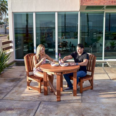 Round Outdoor Patio Table (Options: 3 1/2', 2 Chairs, Mature Redwood, Luna Chairs, No Cushions, Side Chairs only (no arms), Standard Tabletop, No Lazy Susan, No Umbrella Hole, Transparent Premium Sealant).  Photo Courtesy of The Estero Beach Resort of Ensenada, Mexico. 