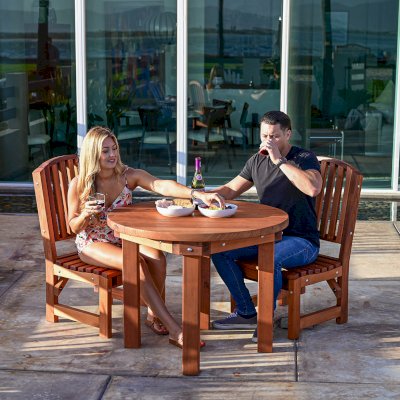 Round Outdoor Patio Table (Options: 3 1/2', 2 Chairs, Mature Redwood, Luna Chairs, No Cushions, Side Chairs only (no arms), Standard Tabletop, No Lazy Susan, No Umbrella Hole, Transparent Premium Sealant).  Photo Courtesy of The Estero Beach Resort of Ensenada, Mexico. 