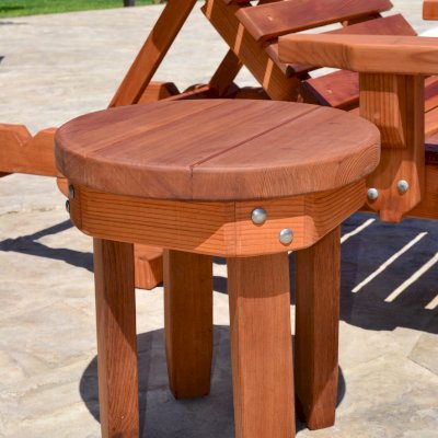 Round Solid Wood Side Table (Options: 18" size, Old-Growth Redwood, Rounded Apron, 18"H, Transparent Premium Sealant). Photo also shows The Poolside Privacy Panel and Sol Lounger.