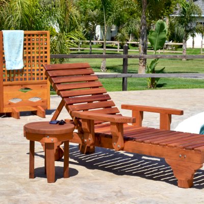 Round Solid Wood Side Table (Options: 18" size, Old-Growth Redwood, Rounded Apron, 18"H, Transparent Premium Sealant). Photo also shows The Poolside Privacy Panel and Sol Lounger.