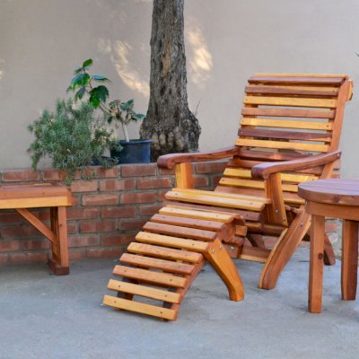 Round Solid Wood Side Table (Options: 24" size, Old-Growth Redwood, Rounded Apron, 22" H, Transparent Premium Sealant). Photo also shows a Lighthouse Bench and Ensenada Easychair with Ottoman. 