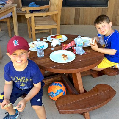 Round Wooden Picnic Table for Toddlers (Mature Redwood, No Umbrella Hole, Standard Tabletop, No ADA, Transparent Premium Sealant). Photo Courtesy of J. Kunz of Portola Valley, CA. Note: pale, thin other wood furniture is not ours!!