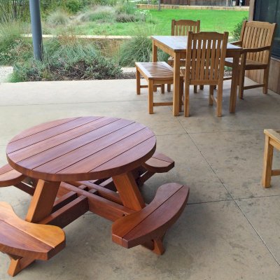 Round Wooden Picnic Table for Toddlers (Mature Redwood, No Umbrella Hole, Standard Tabletop, No ADA, Transparent Premium Sealant). Photo Courtesy of J. Kunz of Portola Valley, CA. Note: pale, thin other wood furniture is not ours!!