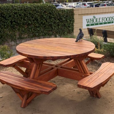 Round Wooden Picnic Tables (Attached Benches) (Options: 5' Diameter, Attached Benches, Mosaic Redwood, Standard Tabletop, No Lazy Susan, Umbrella Hole & Plug, Transparent Premium Sealant). Photo Courtesy of Whole Foods Market of San Rafael, CA.
