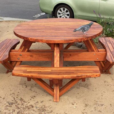 Round Wooden Picnic Tables (Attached Benches) (Options: 5' Diameter, Attached Benches, Mosaic Redwood, Standard Tabletop, No Lazy Susan, Umbrella Hole & Plug, Transparent Premium Sealant). Photo Courtesy of Whole Foods Market of San Rafael, CA.