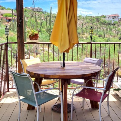 Round Wooden Picnic Tables (Detached Benches) (Options: 4 1/2' Diameter, No Seating, Mosaic Redwood, Round Picnic Bench, Parquet Tabletop, No Lazy Susan, 1 5/8" Umbrella Hole, Transparent Premium Sealant). Photo Courtesy of G. Flacke of Tucson, AZ.