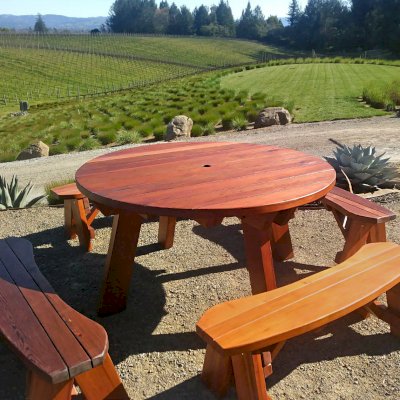 Round Wooden Picnic Table (Detached Benches) (Options: 5' diameter, Unattached Benches, California Redwood, Round Picnic Bench, Standard Tabletop, No Lazy Susan, 2" Umbrella Hole, Transparent Premium Sealant). Photo Courtesy of C. Bailey of Sebastopol, CA.