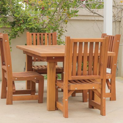 4 Ruth Redwood Dining Chairs (Options: No Arms, Mature Redwood, No Cushion, Transparent Premium Sealant) with a San Francisco Patio Table. Photo Courtesy of J. Schulte of Laguna Niguel, CA.
