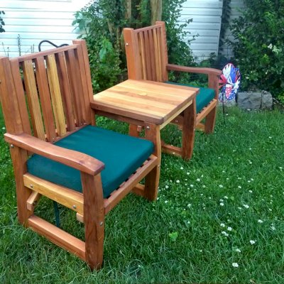 Ruth Vignette Wood Settee (Options: California Redwood, Slightly Rounded Corners, 1 5/8" Diameter Umbrella Hole, Forest Green Cushion, Transparent Premium Sealant).