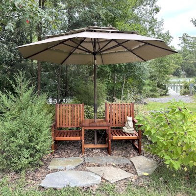 Ruth Vignette Wood Settee (Options: Mature Redwood, Slightly Rounded Corners, 2" Umbrella Hole, No Custom Cushion, Transparent Premium Sealant). Photo Courtesy of M. Kramer of Lottsburg, Va.