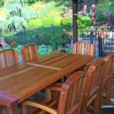 San Francisco Redwood Patio Table (Options: 8' L, 40 1/4" W Tabletop, Chairs, California Redwood, 8 Chairs, Luna Chair Design, All Arm Chairs, No Cushions, Old Country Tabletop, Standard, Rounded Corners, No Umbrella Hole, Transparent Premium Sealant). Photo Courtesy of B. Andersen of Hasbrouck Heights, New Jersey.