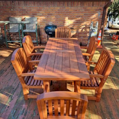 San Francisco Redwood Patio Table (Options: 7' L, 34 1/2" W Tabletop, Chairs, Old-Growth Redwood, 6 Chairs, Luna Chair Style, All Arm Chairs, No Cushions, Old Country Tabletop, Standard, Slightly Rounded Corners, No Umbrella Hole, Transparent Premium Sealant). Photo Courtesy of J. Abbott of Troy, MI.