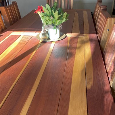 San Francisco Redwood Patio Table (Options: 10' L, 46" W Tabletop, Chairs, California Redwood, 8 Chairs, Ruth Chair Design, All Side Chairs, No Cushions, Old Country Tabletop, Standard, Slightly Rounded Corners, No Umbrella Hole, Transparent Premium Sealant). Photo Courtesy of J. Russo of Monterey, CA.
