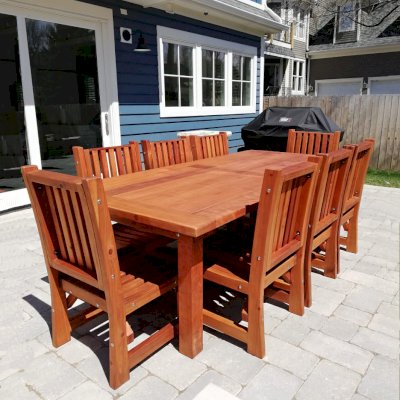 San Francisco Patio Table (Options: 8' L, 48" W Tabletop, Chairs, Mature Redwood, 8 Chairs, Ruth Chair Design, All Side Chairs, No Cushions, Old Country Tabletop, Standard, Slightly Rounded Corners, No Umbrella Hole, Transparent Premium Sealant). Photo Courtesy of K. Pickett of Naperville, Illinois.