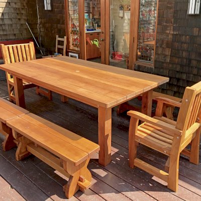 San Francisco Redwood Patio Table (Options: 7' L, 46" W, Benches & End Armchairs, California Redwood, Ruth Chairs, Trestle Benches, 2 Half Length Benches Per Side, Standard Tabletop, Slightly Rounded Corners, 1 5/8" Diameter Umbrella Hole, Transparent Premium Sealant). Photo Courtesy of M. Colbruno of Oakland, CA.