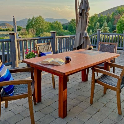 San Francisco Redwood Patio Table (Options: 6' L, 40 1/4" W Tabletop, Mosaic Redwood, No Seating, Standard Tabletop, Slightly Rounded Corners, 2" Umbrella Hole, Transparent Premium Sealant). Photo Courtesy of S. McDowell of Hailey, ID.