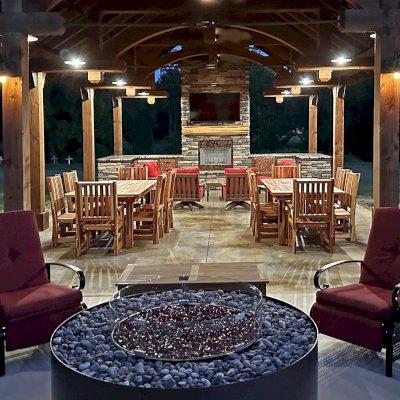 San Francisco Redwood Patio Tables (Options: 7' L, 40 1/4" W Tabletop, Mosaic Redwood, 2 Armchairs + Side Chairs, Ruth Chairs, Old Country Tabletop, Standard, Slightly Rounded Corners, No Umbrella Hole, Transparent Premium Sealant). Photo Courtesy of S. Barrows of Springdale, AR.