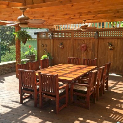 San Francisco Redwood Patio Table (Options: 10' L, 57 1/2" W Tabletop, Chairs, Douglas-fir, 10 Chairs, Ruth Chair Design, All Armchairs, Custom Cushions, Old-Country Standard Tabletop, Rounded Corners, No Umbrella Hole, Transparent Premium Sealant). Photo Courtesy of Alexis Horvath.