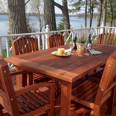 San Francisco Redwood Patio Table (Options: 8' L, 46" W Tabletop, Chairs, Old-Growth Redwood, 6 Luna Chairs, 2 Armchairs & Side Chairs, No Cusions, Old Country Tabletop - Standard, Squared Corners, No Hole, Transparent Premium Sealant). Photo Courtesy of Christine Talaber of Antioch, Illinois.