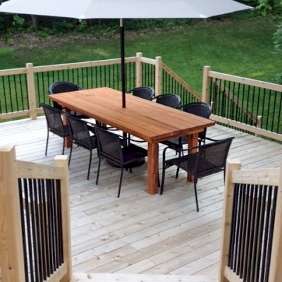 San Francisco Redwood Patio Table (Options: 8' L, 40 1/4" W Tabletop, No Seating [Photo Shows Customer's Chairs], Redwood, Standard Tabletop, Rounded Corners, Umbrella Hole [Umbrella not Included], Transparent Premium Sealant). Photo Courtesy of Douglas Rappley of Rockford, Michigan.