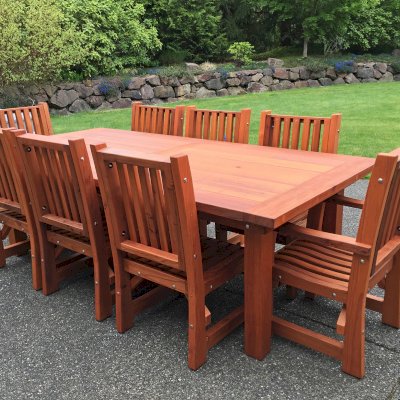San Francisco Redwood Patio Table (Options: 8 ft, 46" W Tabletop, Chairs, Mature Redwood, 8 Chairs, Ruth, 2 Armchairs + Side Chairs, No Cushions, Old Country Tabletop, Standard, Squared Corners, No Umbrella Hole, Transparent Premium Sealant). Photo Courtesy of L. Ben-Gan of Redmond, WA.