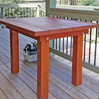 San Francisco Redwood Patio Table (Options: 4' L, 34 1/2" W Tabletop, Mature Redwood, No Seating, Standard Tabletop, Slightly Rounded Corners, No Umbrella Hole, Transparent Premium Sealant). Photo Courtesy of L. Moran of Virginia Beach, VA.