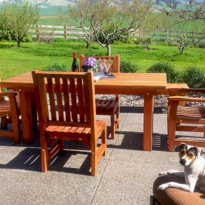 San Francisco Redwood Patio Table (Options: 6' L, 46" W Tabletop, Chairs, Mature Redwood, 4 Chairs, Ruth Chair Design, 2 Armchairs & Side Chairs, No Cushions, Standard Tabletop, Slightly Rounded Corners, No Umbrella Hole, Transparent Premium Sealant). Photo Courtesy of Martha Clinehens of Walla Walla, Washington.