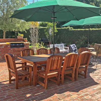 San Francisco Redwood Patio Table (Options: 8' L, 40 1/4" W Tabletop, Chairs, California Redwood, 8 Chairs, Luna Chair Design, 2 Armchairs & Side Chairs, No Cushions, Old Country Tabletop, Seamless, Slightly Rounded Corners, 1 5/8" Umbrella Hole, Transparent Premium Sealant). Photo Courtesy of N. Kepner of Whittier, CA.