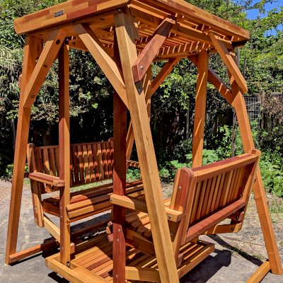 Santa Rosa Face to Face Gliders (Adult Size, Mosaic Redwood, No Kid's Platform, No Engraving, Transparent Premium Sealant). Photo Courtesy of A. McChesney-Young of Berkeley, California.