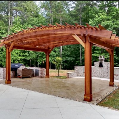 Sebastopol Pergolas (Options: 22' L x 16' Arc W, California Redwood, 4-Post Anchor Kit for Concrete, Vertical Post Decorative Trims, No Ceiling Fan Base, Transparent Premium Sealant). Photo Courtesy of G. Merck of Fayetteville, Georgia. 