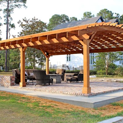 Sebastopol Pergolas (Options: 32' L x 24' Arc W, California Redwood, 6-Post Anchor Kit for High-Wind, No Ceiling Fan Base, Transparent Premium Sealant). Photo Courtesy of J. Graves of Santa Rosa Beach, Florida.